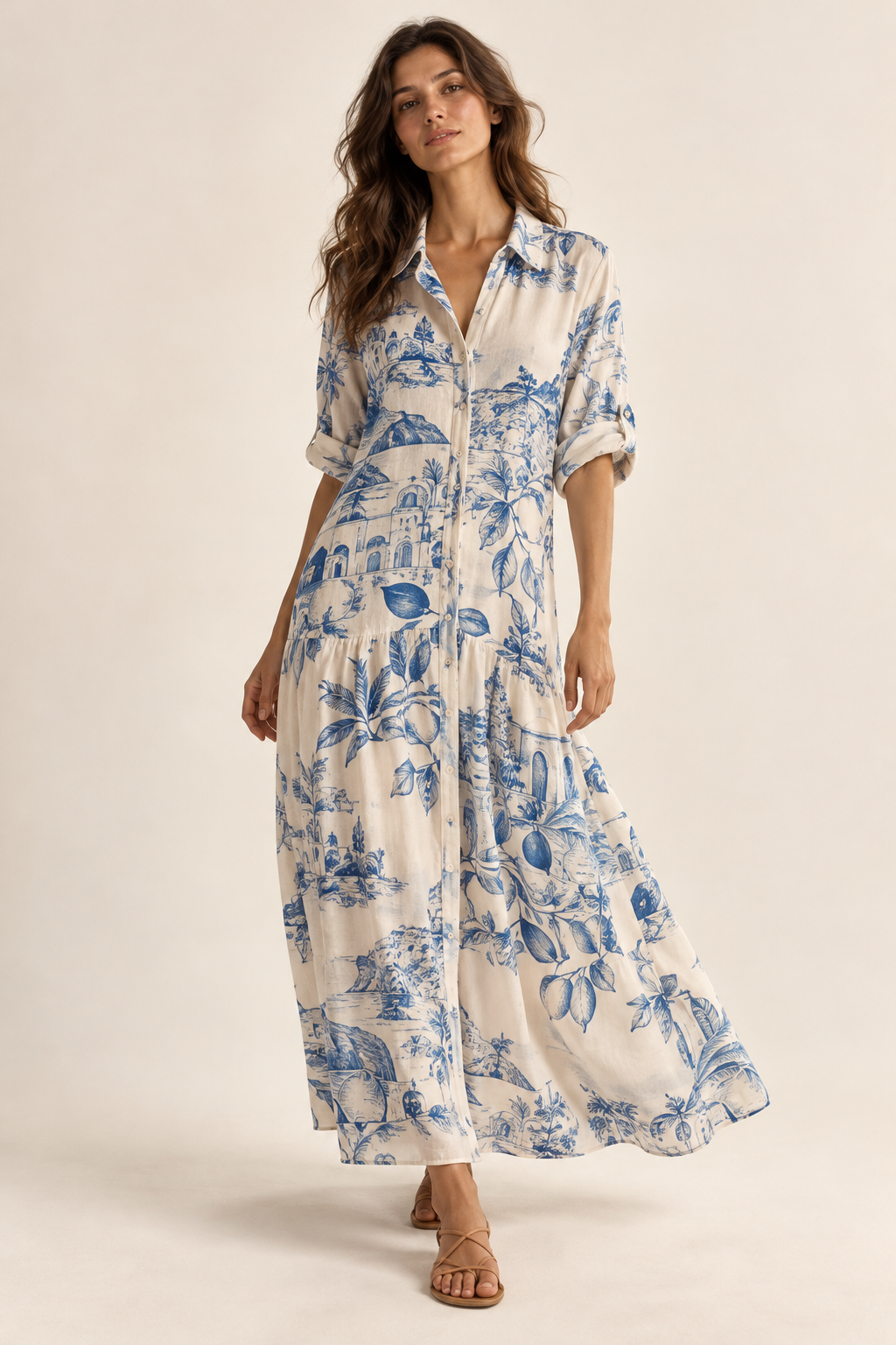 Imagen conceptual generada por IA de vestido camisero largo con estampado de inspiración mediterránea; no representa el artículo definitivo
